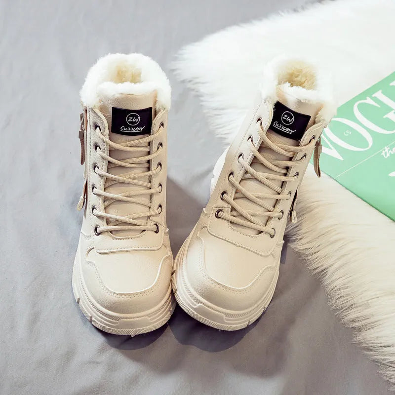 Plus size women's tall lace-up snow boots with fleece lining and a rubber sole.