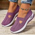 Women's casual mesh shoes with T-strap in various colours showing round toe and flat heel design