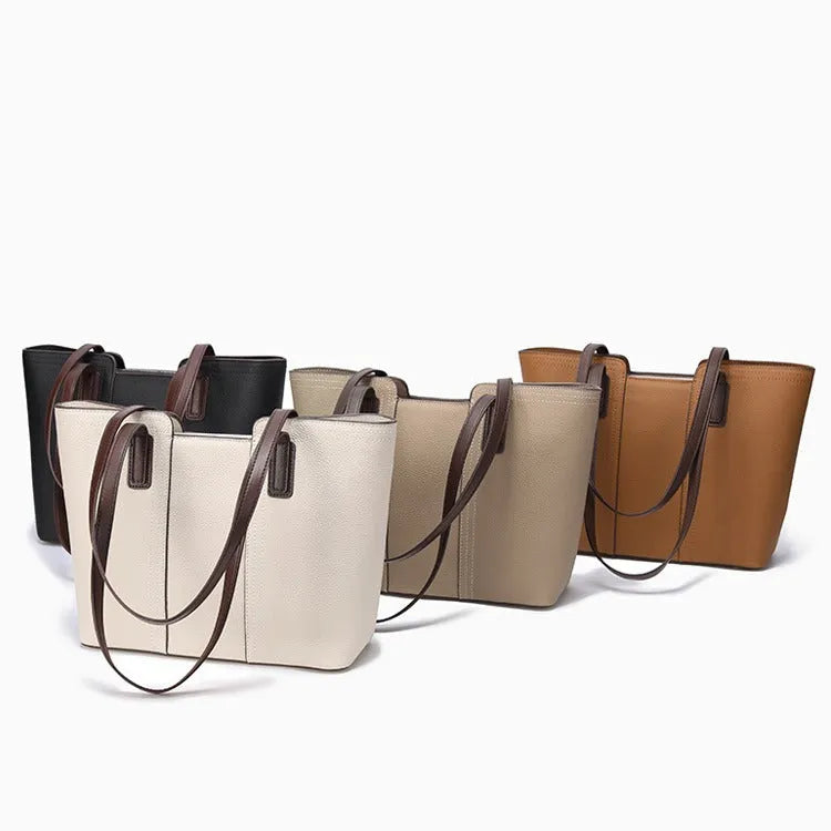 Women's genuine leather commuter shoulder bag in khaki colour showing box-type shape and shoulder strap