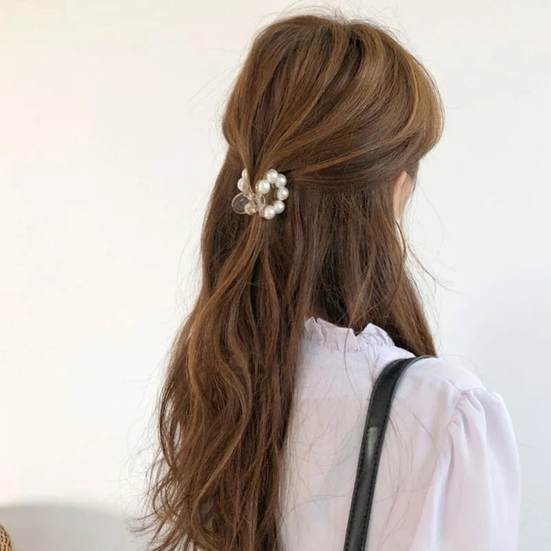 Women's pearl hair barrette in big pearl colour, manual finish, front view