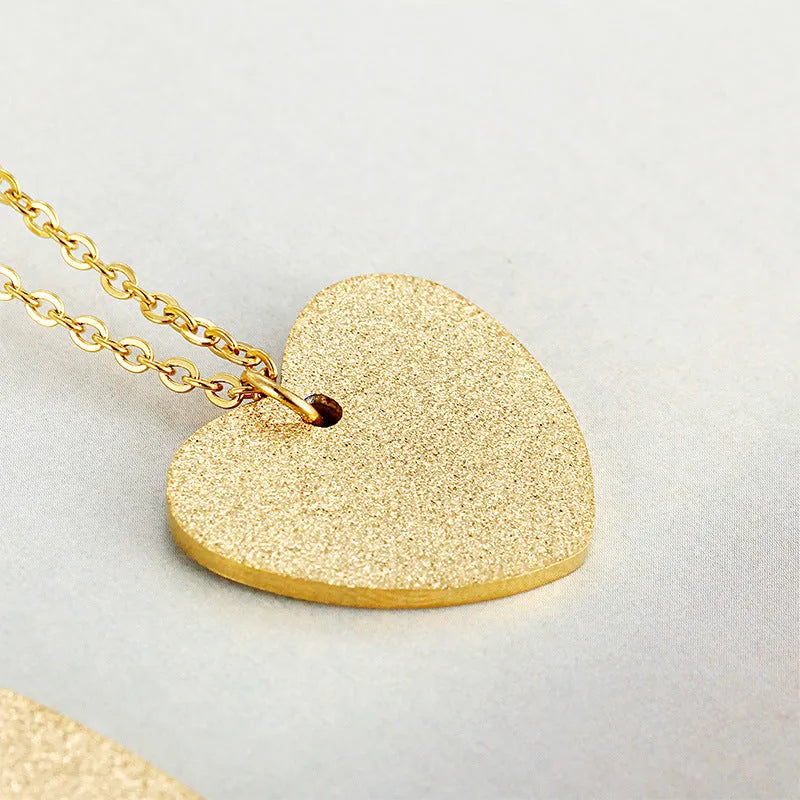 Women's titanium steel necklace with geometric heart-shaped pendant in colour KN25736-Z