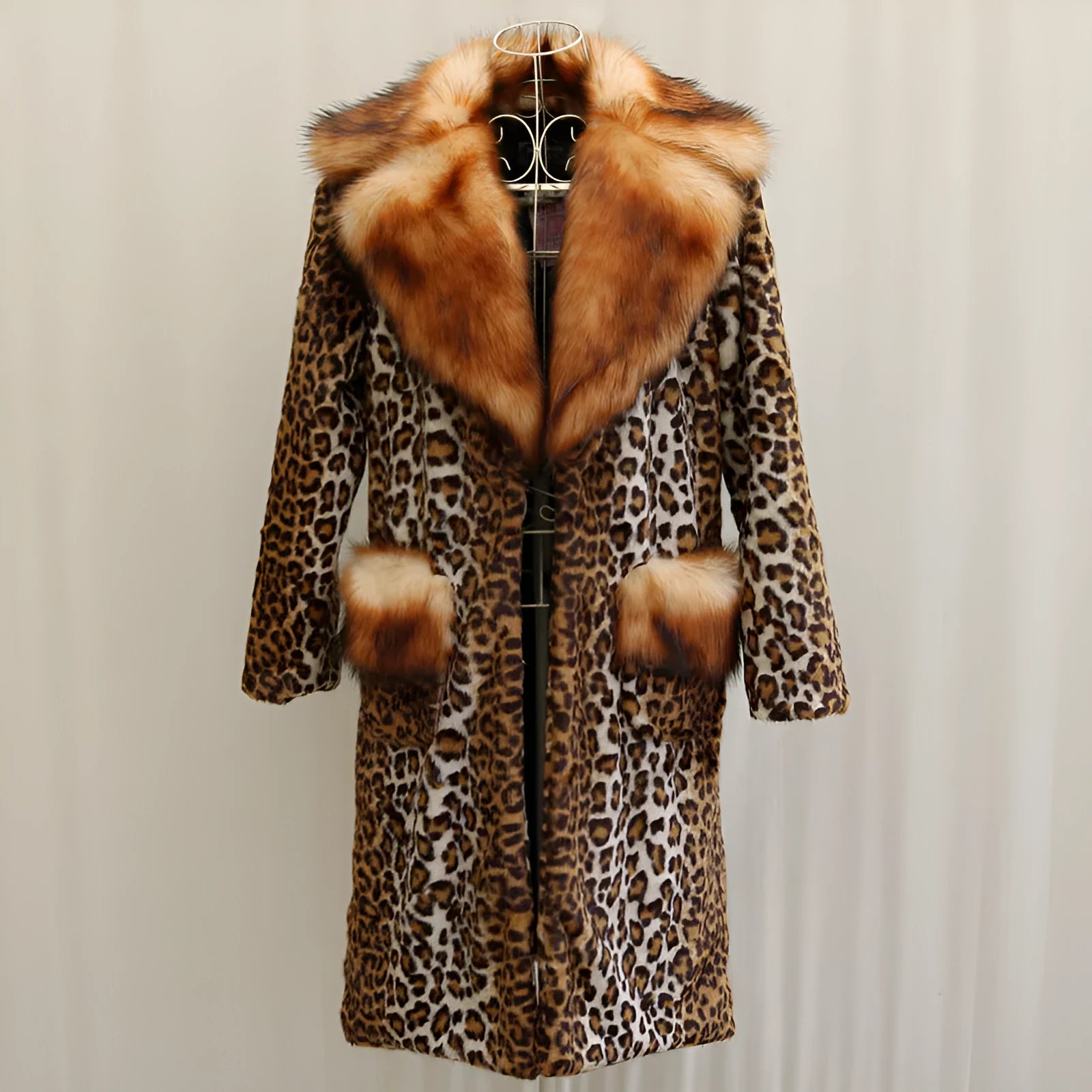 Women's long leopard print artificial fur jacket with regular sleeves on a hanger