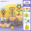 DIY plum blossom building blocks arranged in flower shape with rainbow colour pieces on white background