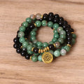 Green and black elastic beaded bracelet with alloy construction for women's wrist jewellery