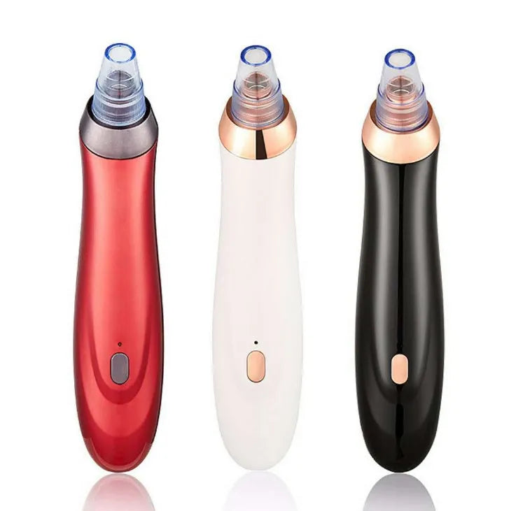 Electric blackhead remover device with four nozzle attachments for pore cleaning and acne extraction