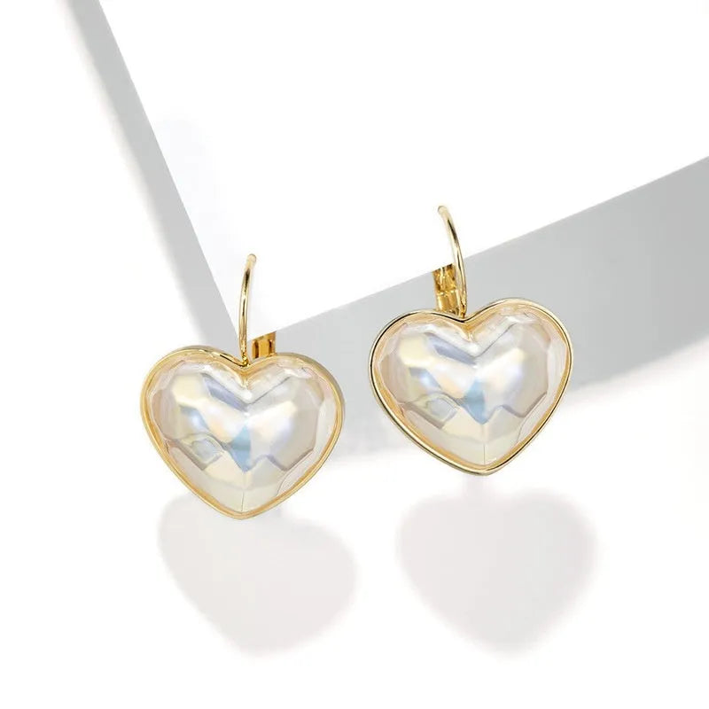 Gold colour alloy clip-on earrings for women with natural summer style