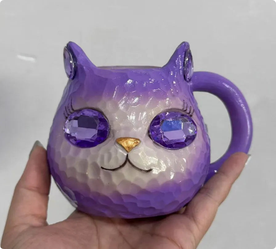 Resin crystal earth cat cup craft ornament in American style, shown in blue, green, pink, and purple colour options.