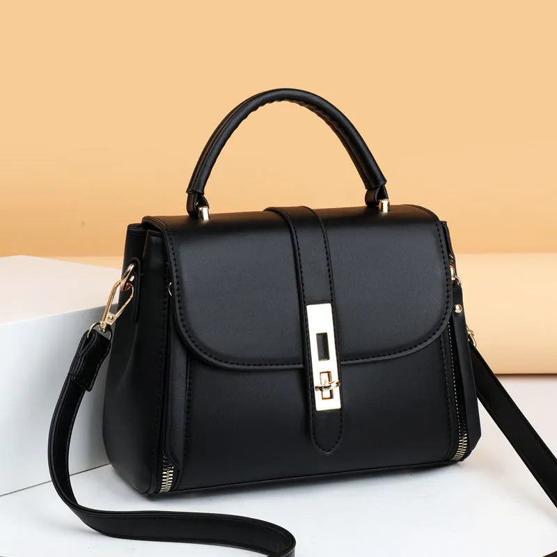 Soft leather women's messenger bag in square vertical design with shoulder strap