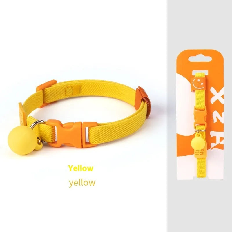 A small dog collar made from high elasticity polyester fabric in a choice of seven colours, adjustable between 22 and 32 cm.