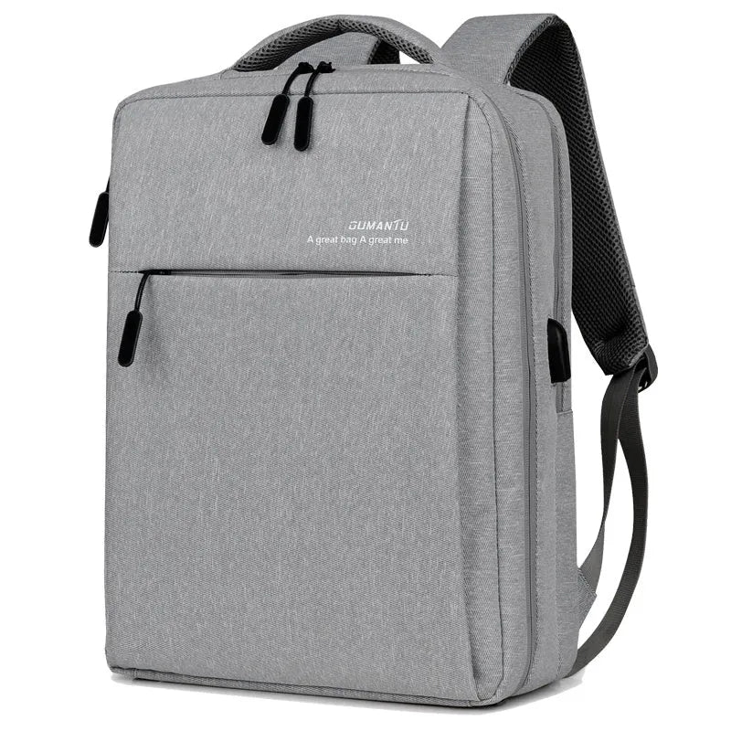 Black waterproof Oxford cloth laptop backpack with shoulder straps, shown with a laptop and charging cable.