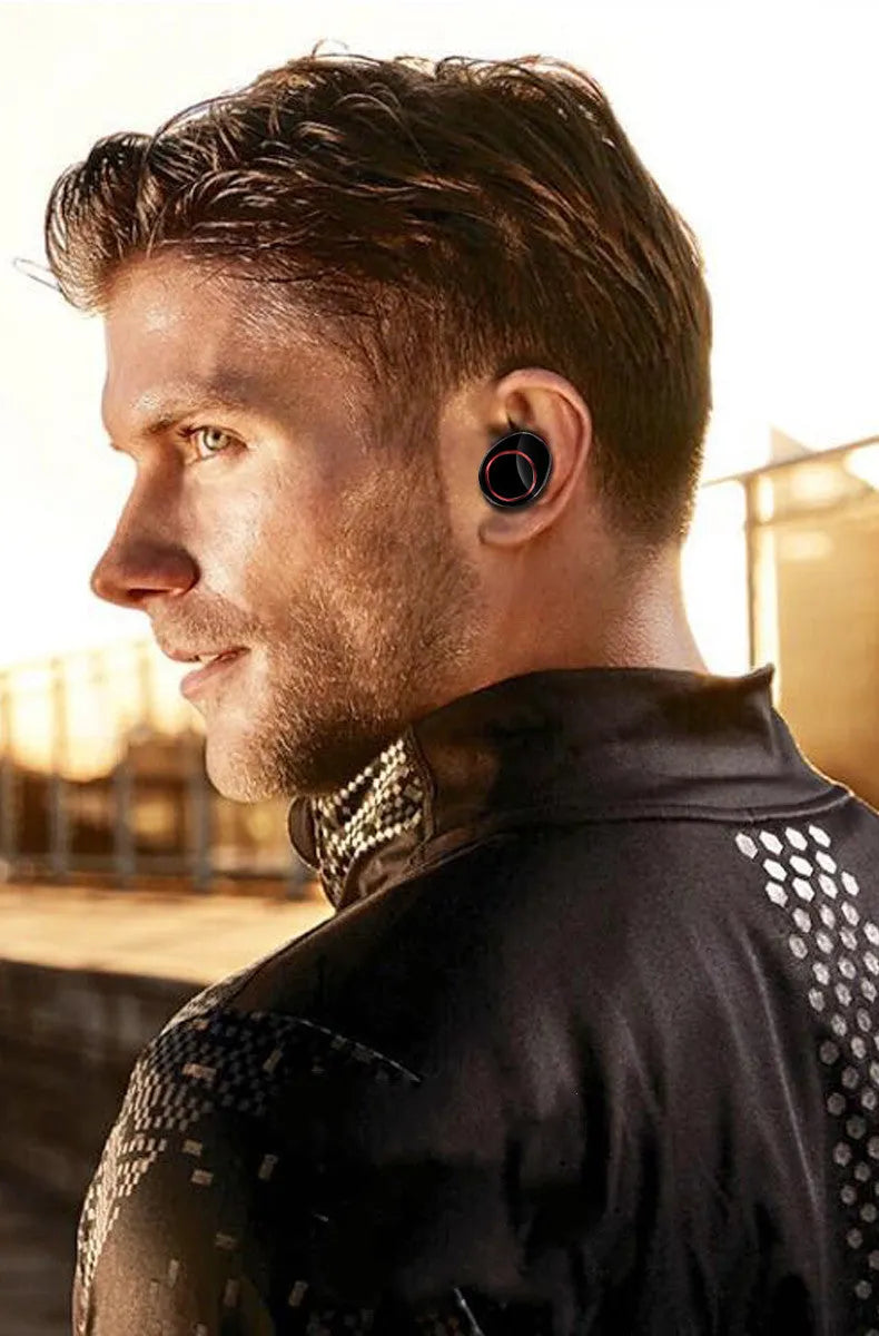 Black X11 Bluetooth wireless earbuds and charging case with six silicone ear sleeves.
