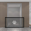 Portable folding dog barrier with cloth net and plastic frame shown with removable doorsill accessory featuring dog footprints