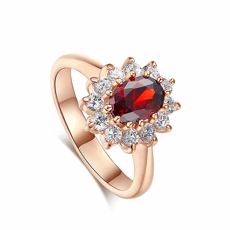 Gold ring with high-grade blue zircon gemstone round cut on white background