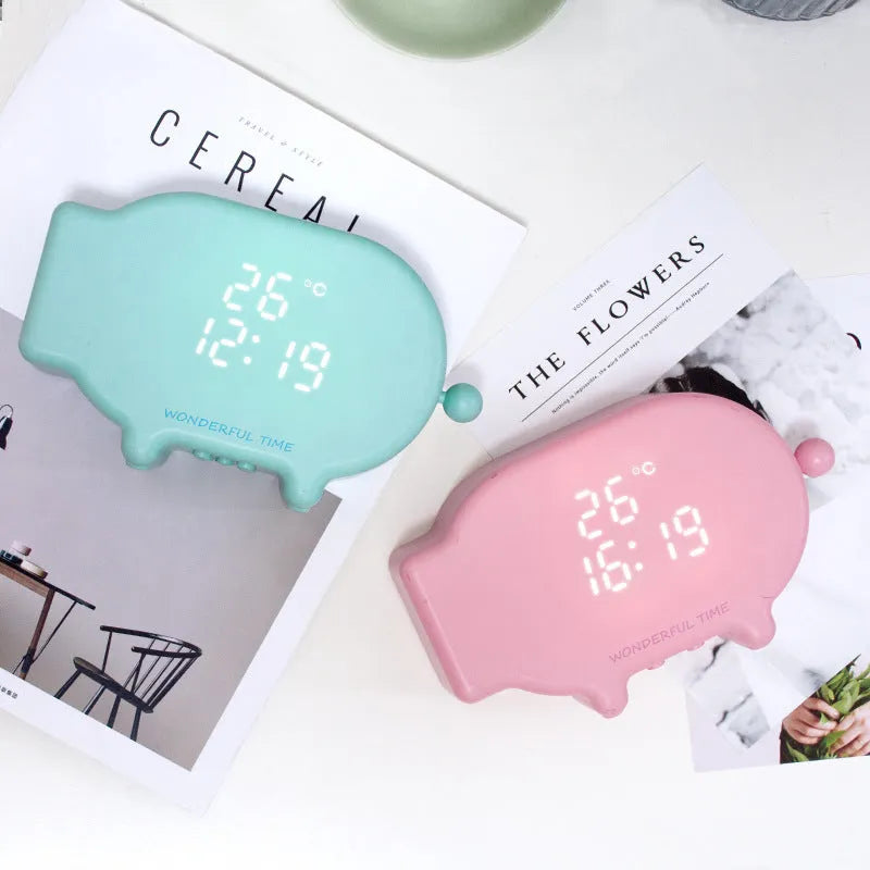 Blue or pink LED alarm clock with digital temperature display and USB charging port