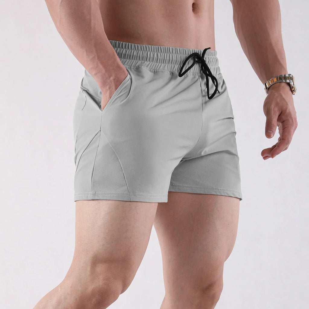 Men's thin polyester basketball shorts in grey colour with medium elastic waistband