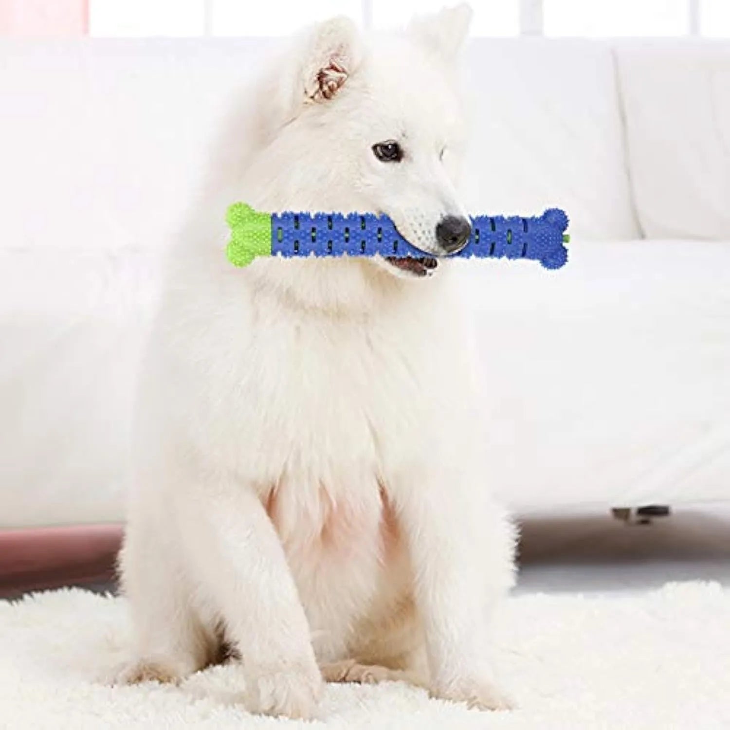 Blue green silicone dog dental cleaning stick with brush head design and gum massage nodules