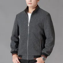Men's gray polyester fleece autumn coat with long sleeves and side pockets in a sports style.