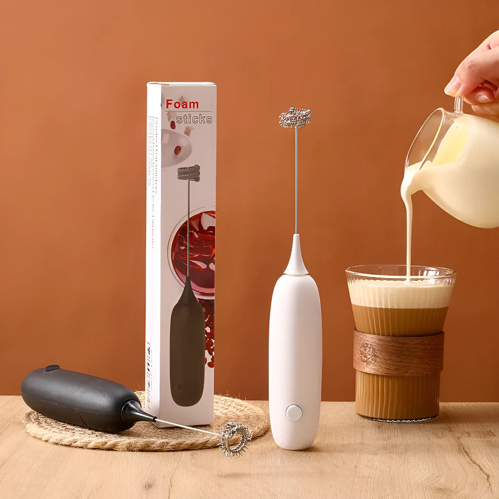 Handheld electric milk frother blender in black and white colours with frothing whisk