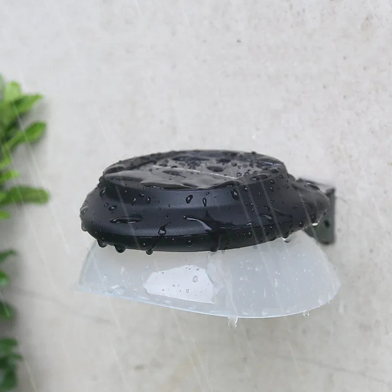 Solar outdoor wall lamp in black or white plastic housing with integrated solar panel and 9 LEDs.