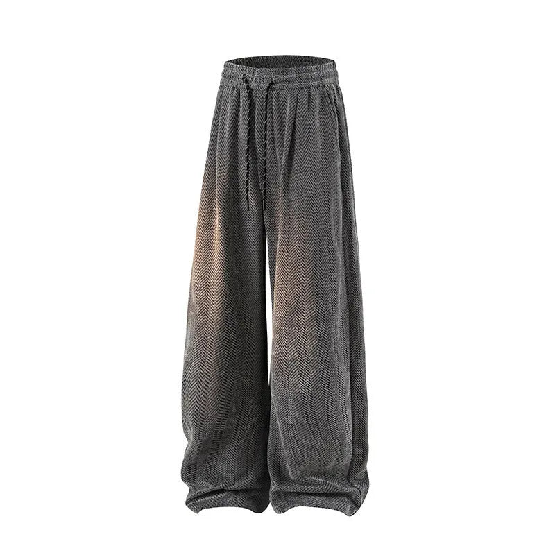 Plus size straight-leg trousers in black with elastic waistband and fleece-lined construction