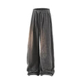 Plus size straight-leg trousers in black with elastic waistband and fleece-lined construction
