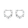 Pair of sterling silver retro geometric earrings with round elements and electroplated finish
