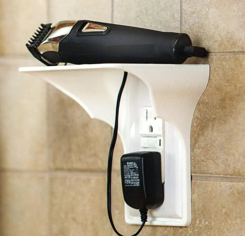 White plastic socket storage rack with clear removable compartments on wall mount
