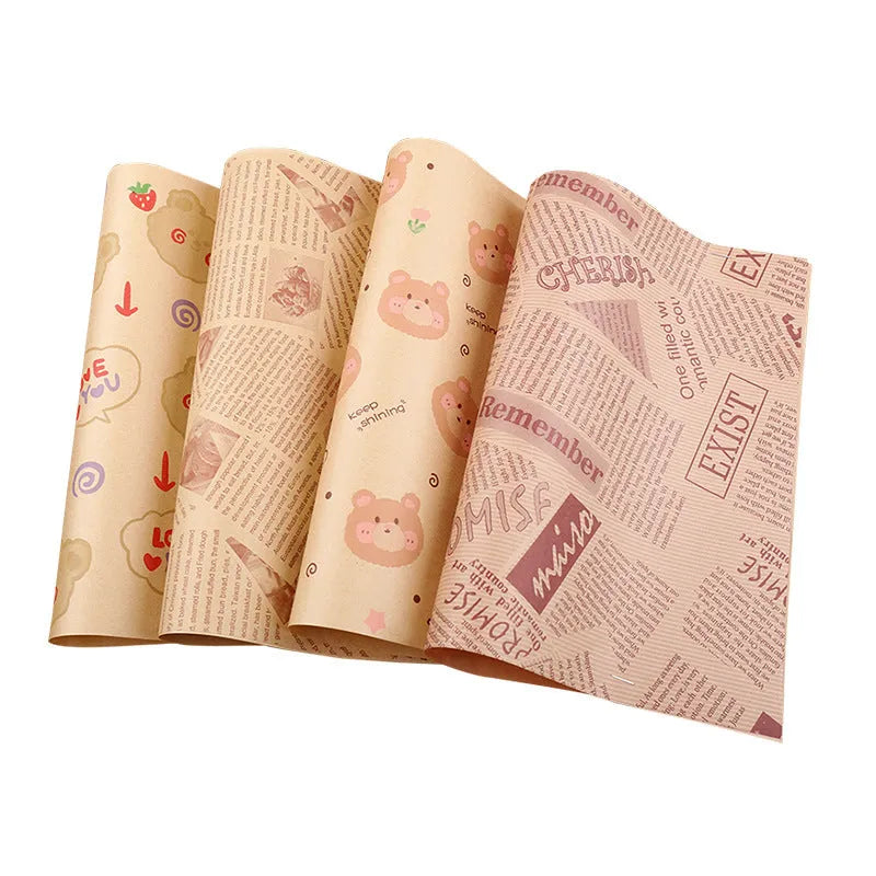 Stack of 28x38cm microwaveable food grade anti-oil Kraft baking paper sheets in English, newspaper, and retro styles