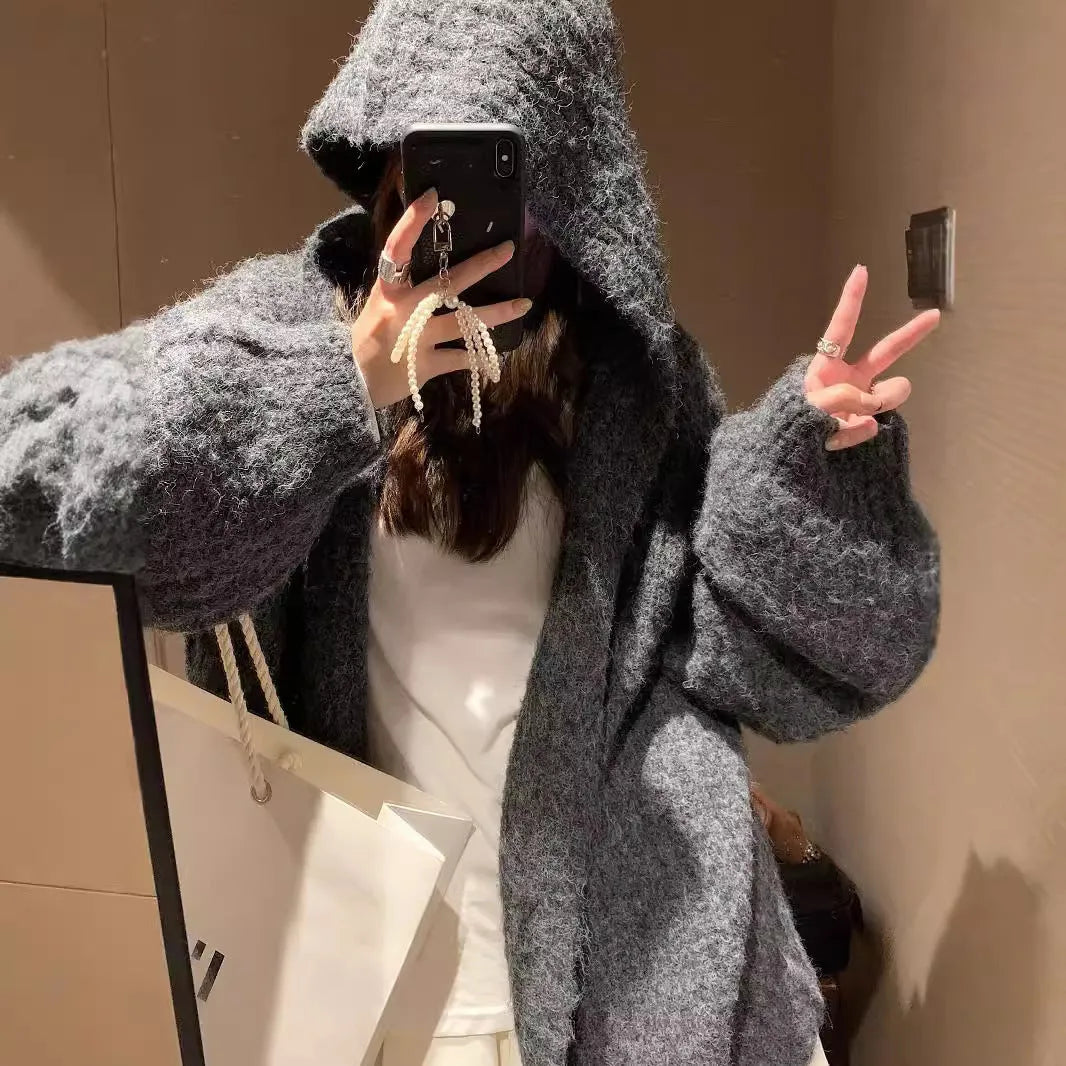 Women's thick grey hooded cardigan sweater with loose fit and regular sleeves