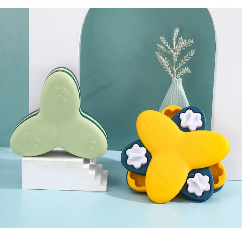 Green dog puzzle toy with bone-shaped lids and non-slip base for treat dispensing