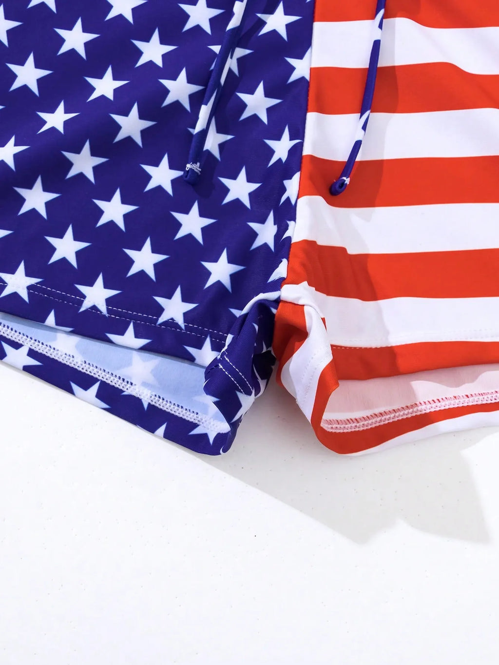 Women's high waist boxer swimsuit with drawstring waistband and red white blue stars and stripes pattern