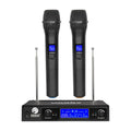 Black V-3002 wireless handheld microphone set with two mics and a transmitter on a dark surface.