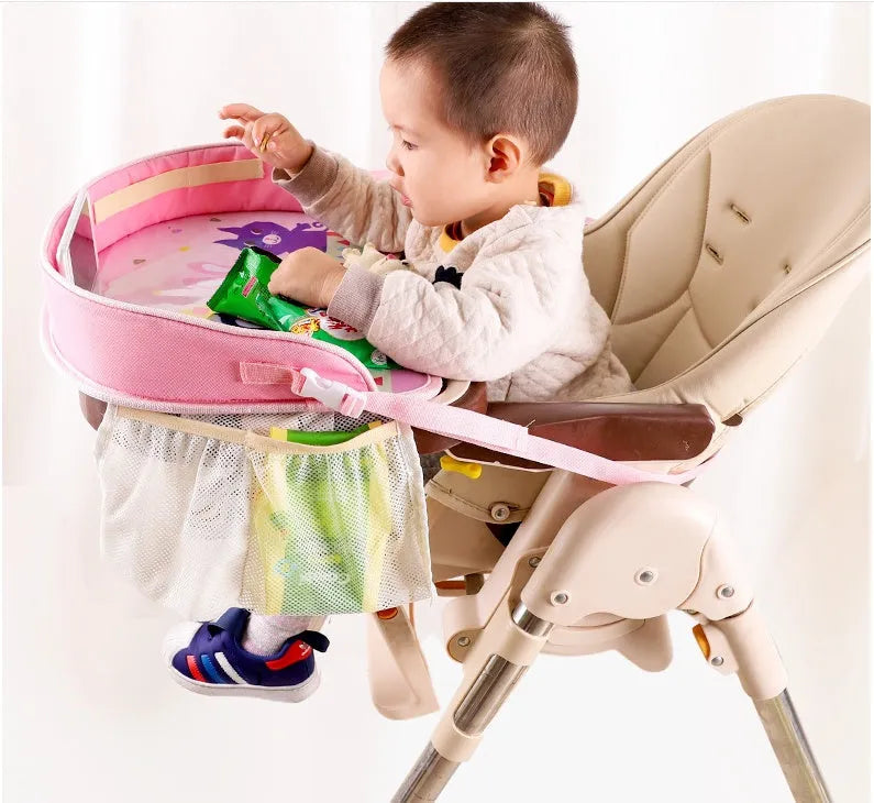 Baby car seat tray table in blue Oxford fabric and polyester, 42x32x8 cm, on a car seat