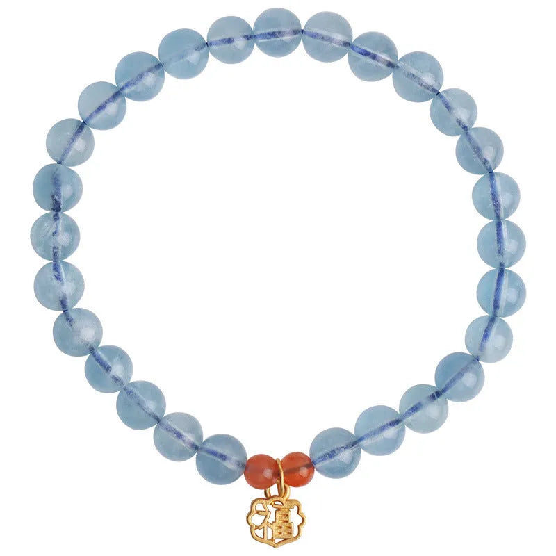Women's bracelet with 8mm ice translucent aquamarine crystal beads and sequin details