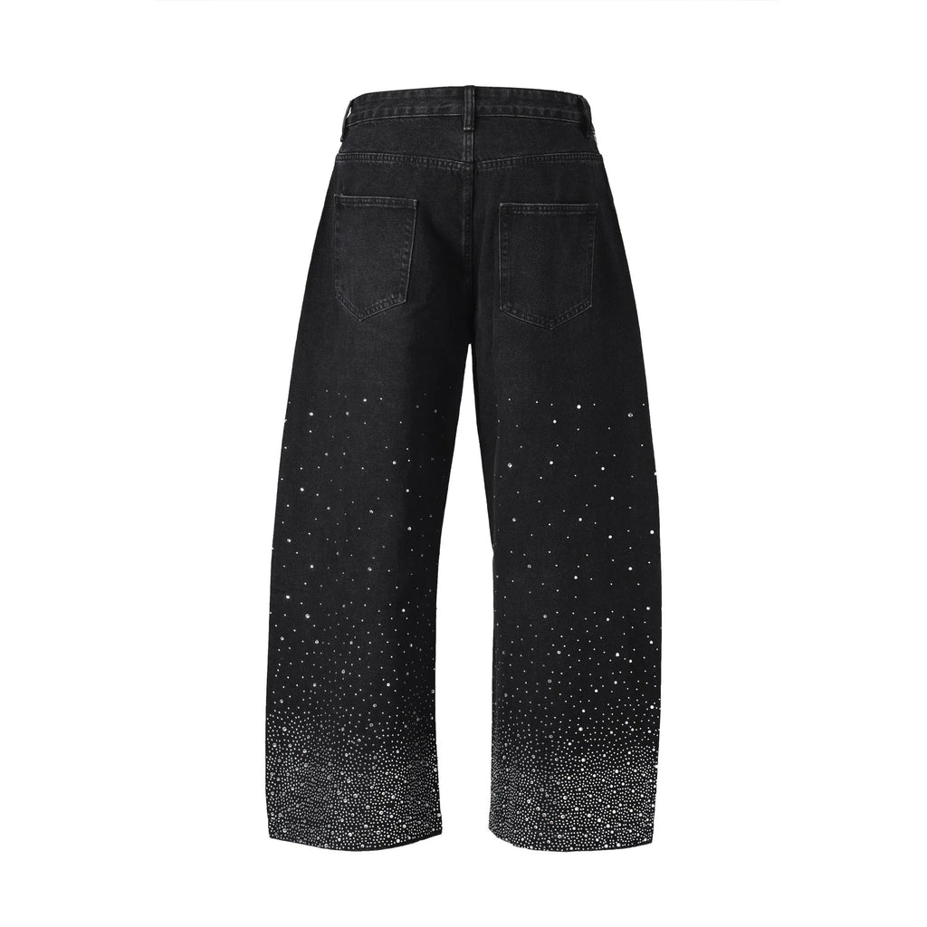 Blue loose-fitting wide-leg cotton trousers on a hanger, showing the relaxed silhouette.