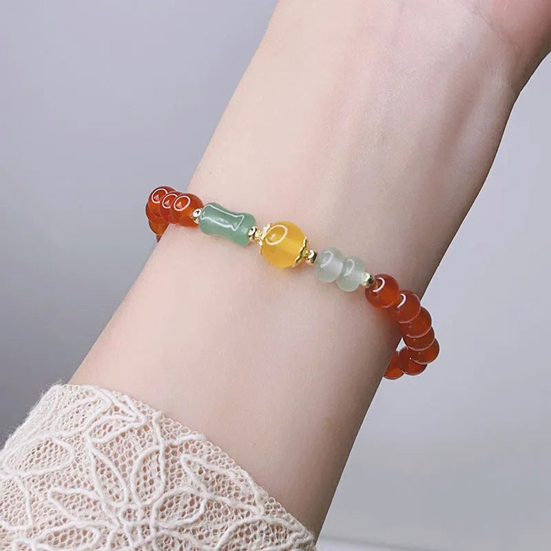 Red agate bracelet for women with dragon motifs and traditional Chinese lucky charms