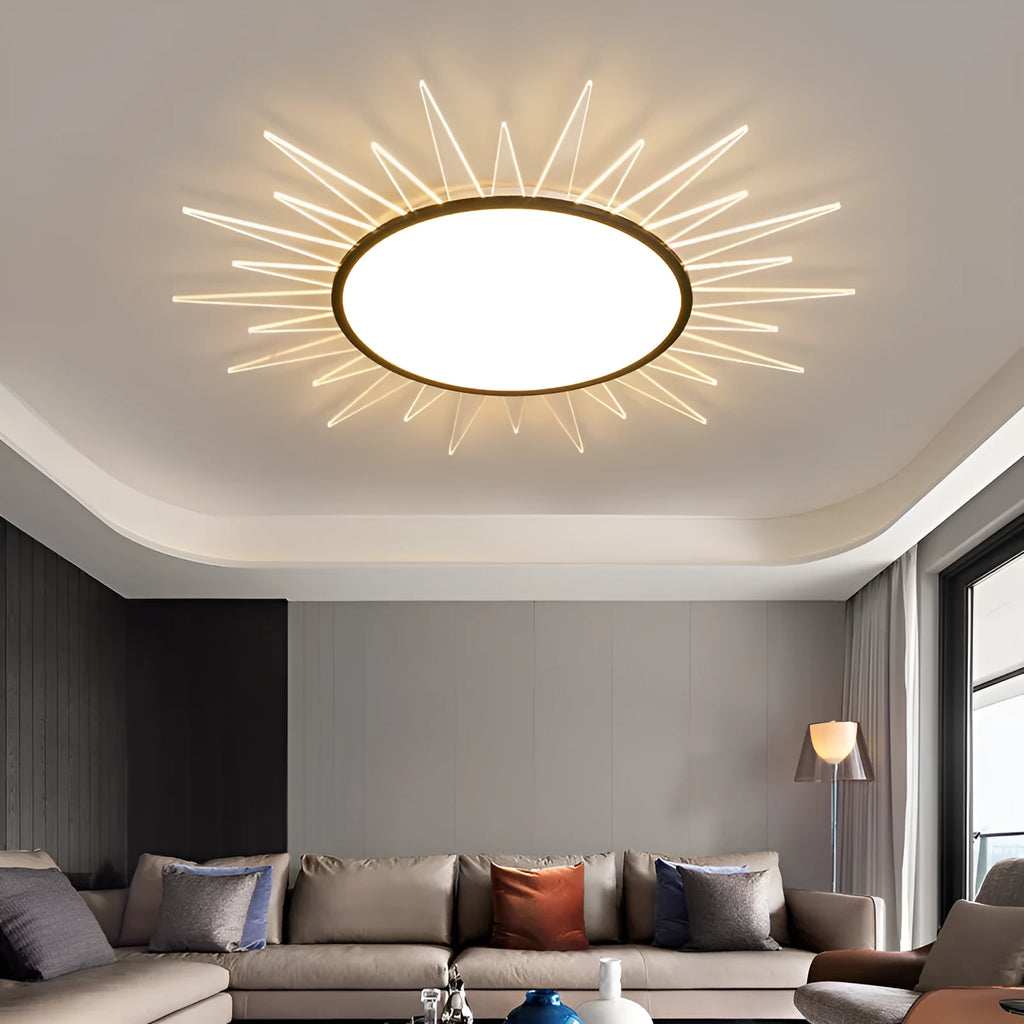 Modern round aluminium ceiling lamp with LED light source on a white ceiling.