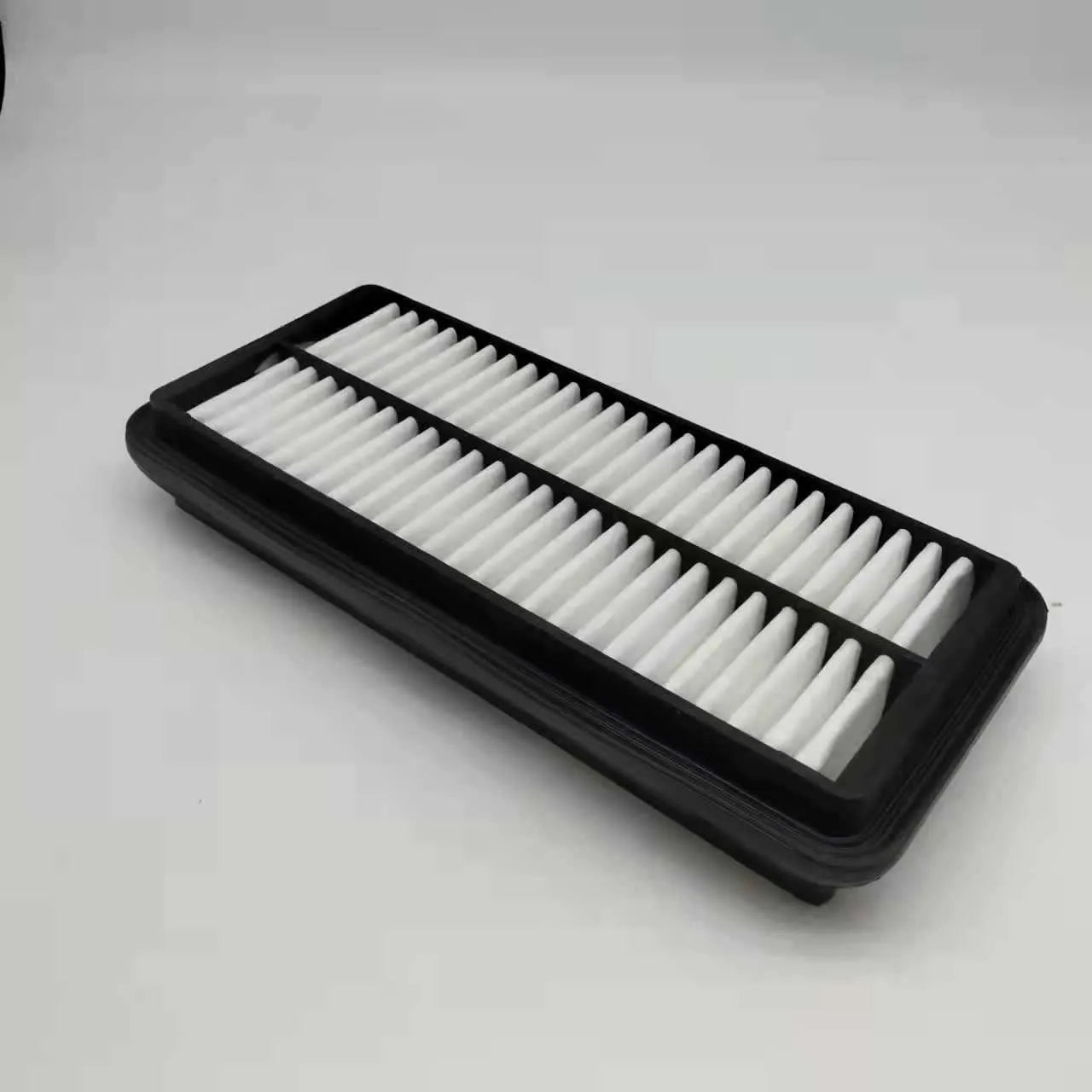 Black car air filter for Modern vehicles with dimensions 256*113*40 mm