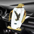 Eagle style wireless charging car phone holder with a suction cup mount in black and gold.