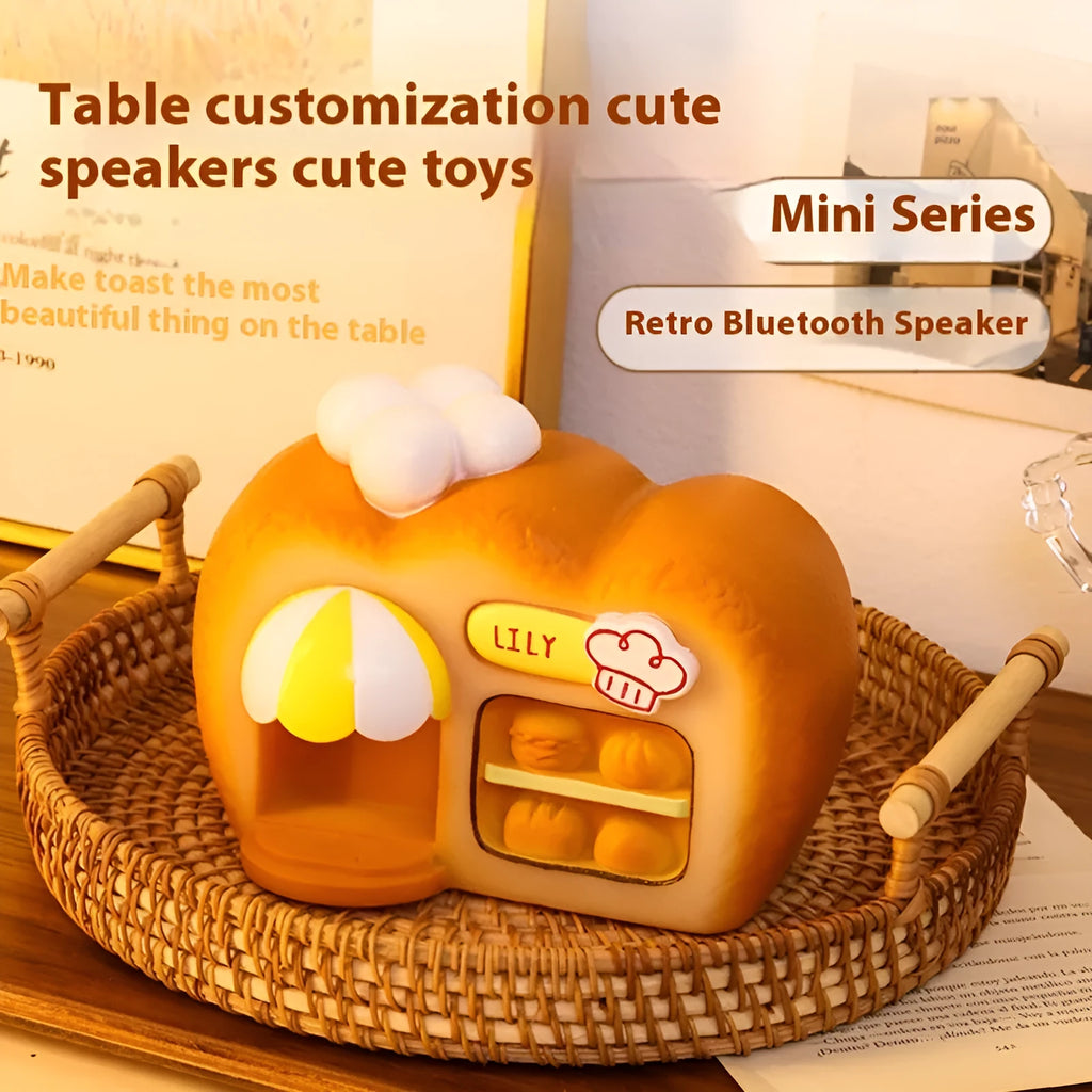 White ABS bakery Bluetooth speaker with glowing ornament design and 50mm driver