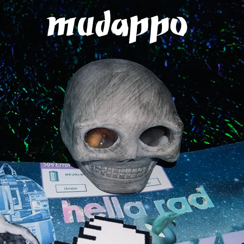 Grey Halloween pinch music decompression ball with skeleton monster face on white background