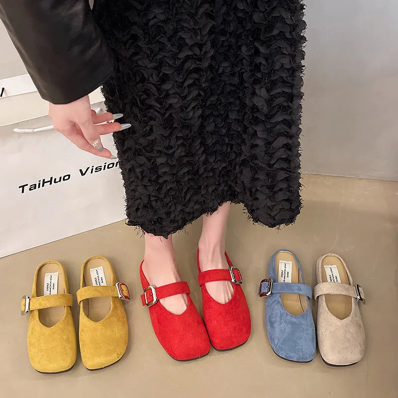 Women's flat apricot PU half slippers with closed square toe and rubber sole.