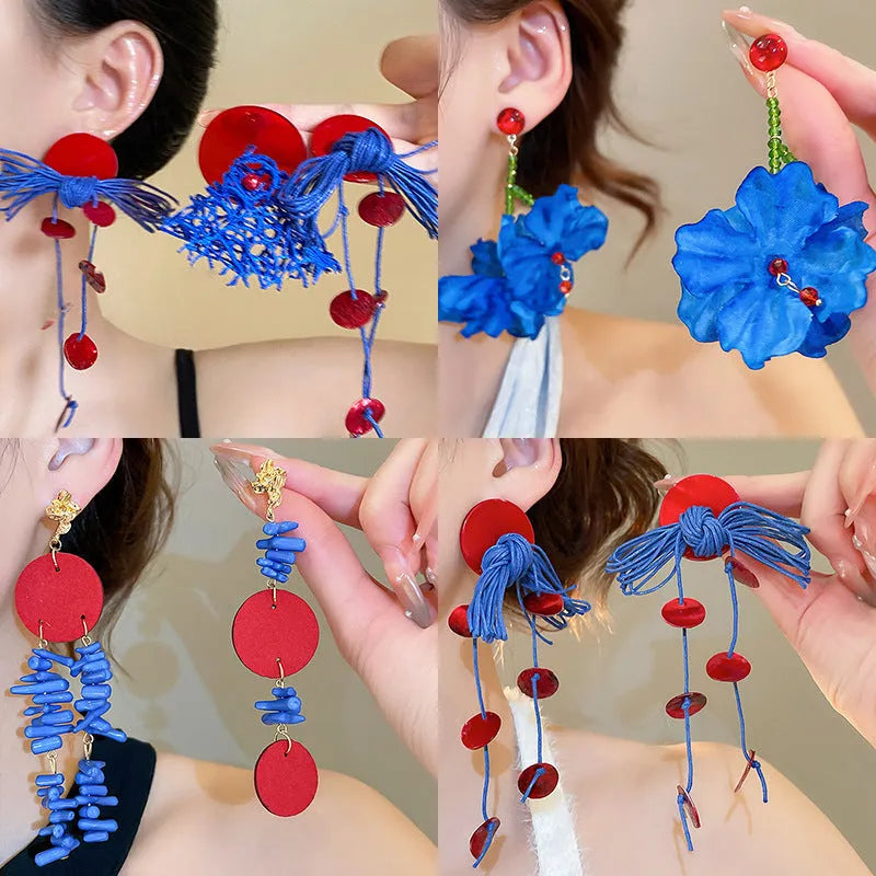 Geometric women's earrings with cloth construction and silver needle-blue resin flower accents
