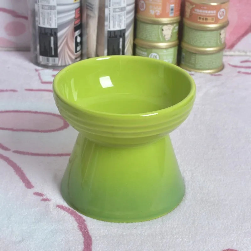 Ceramic pet bowl with high foot design showing anti-tumble stability feature