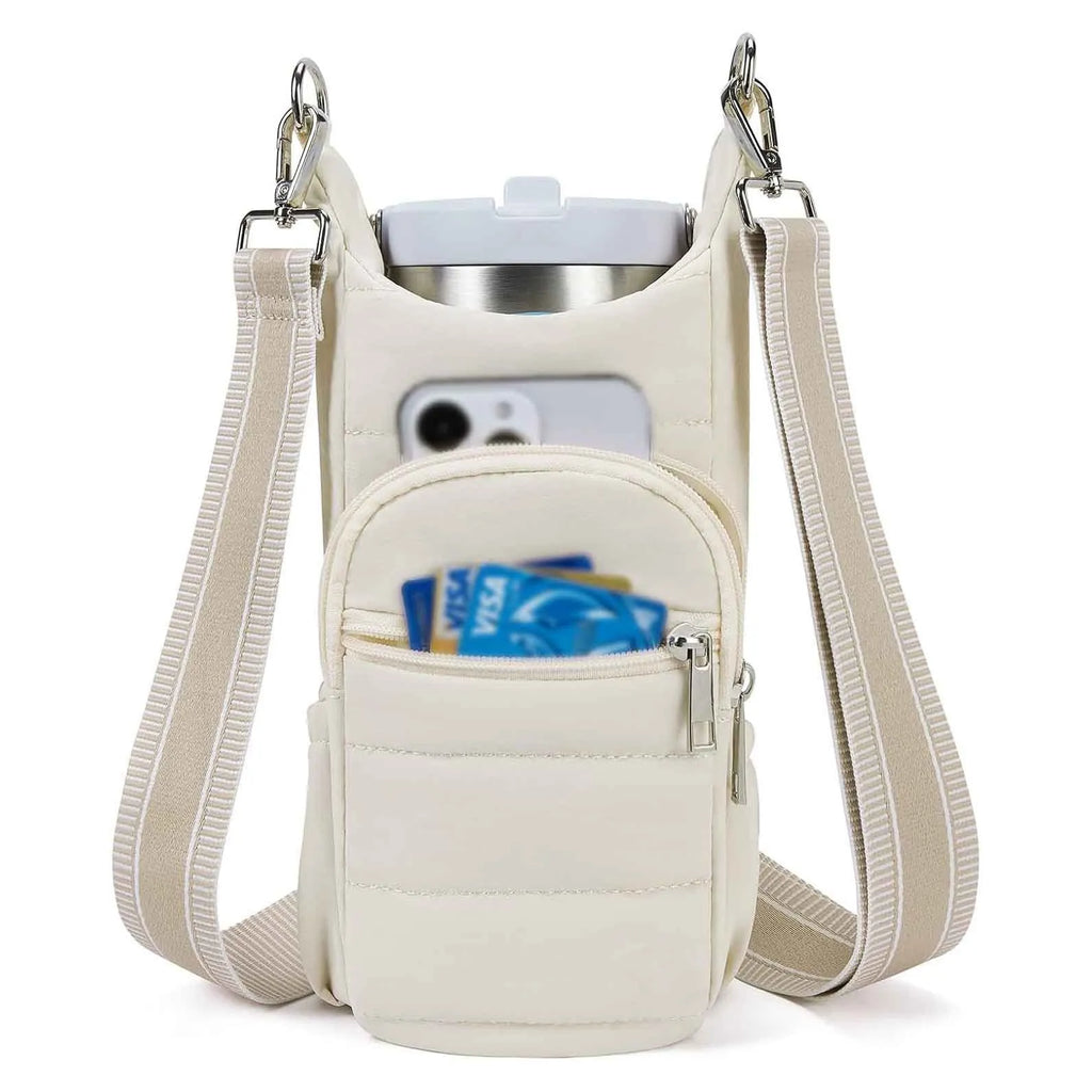 Kettle-shaped cycling water bottle bag in black colour mounted on bicycle handlebars