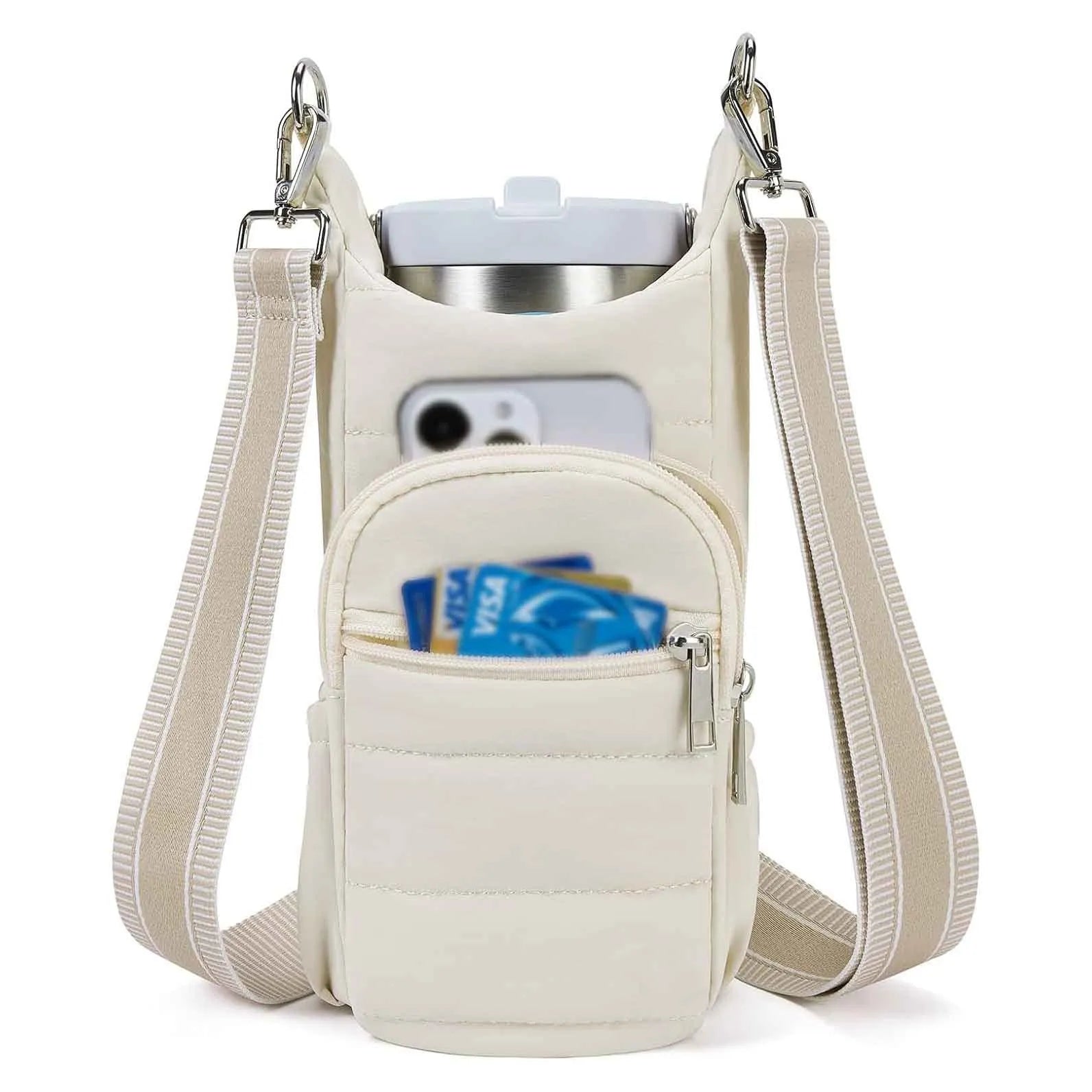Kettle-shaped cycling water bottle bag in black colour mounted on bicycle handlebars