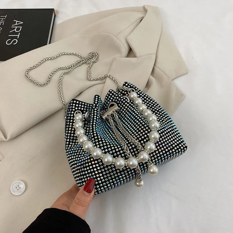 Soft PU leather crossbody bag with diamond embellishments and chain strap in bucket shape