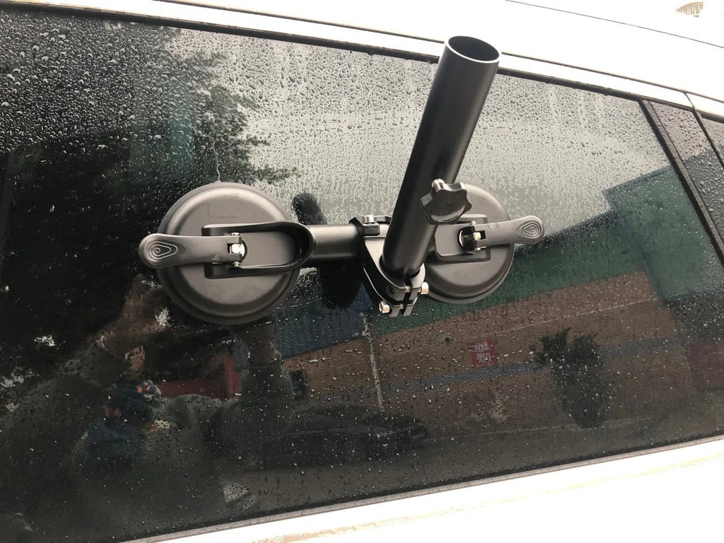 Black off-road car sucker mount with rubber suction cup for attaching flags to vehicle windows.