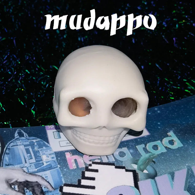 Grey Halloween pinch music decompression ball with skeleton monster face on white background