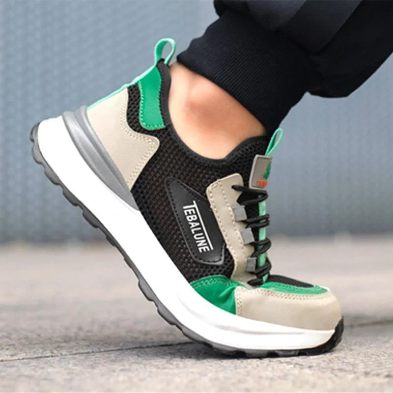 Black and green plastic steel toe safety shoes with mesh upper panels and TPU sole